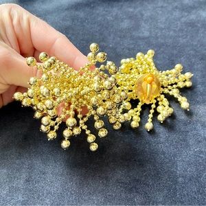 Festive Gold Tone Pom Pom Clip-on Earrings